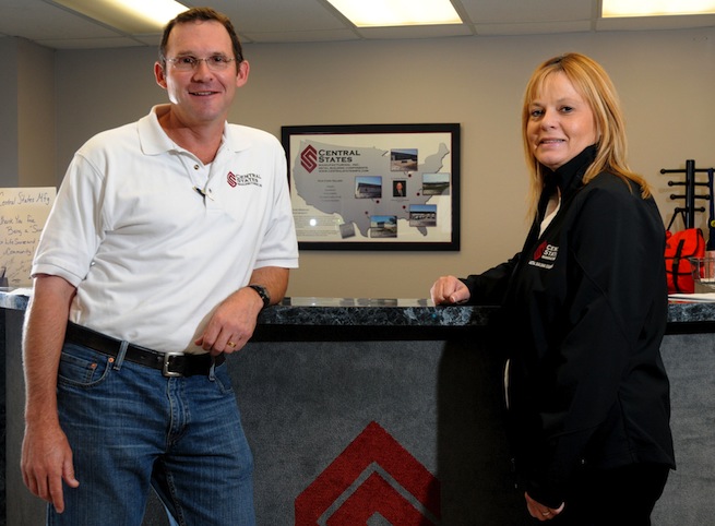 Central States Manufacturing CEO Rick Carpenter, left, and Presidents  Donna Leger stand in the main lobby of their office in Lowell.