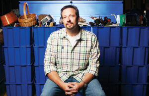 TRASH TO TREASURE Brian Itzkowitz, photographed in the warehouse at the Goodwill retail store on Markham. Brian&rsquo;s wardrobe was assembled using pieces from Goodwill&rsquo;s clothing racks.