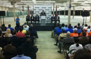 Mayor Mark Stodola speaks Tuesday inside the new Goodwill Resources Center at 7400 Scott Hamilton Drive in Little Rock. Goodwill Industries of Arkansas is making the more than 570,000-SF building its new headquarters. The nonprofit will move into the center this fall.
