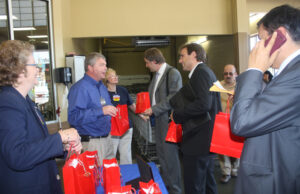 German visitors study Malvern's economy.