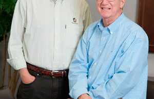 Mike Smith, left, was syndicate manager and J.D. Simpson was a corporate finance executive when they led the initial public offering of Wal-Mart stock by their employer, Stephens Inc. of Little Rock, in 1970.