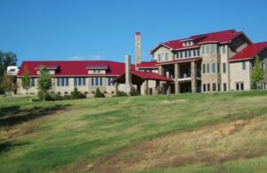 A 13,000-SF mansion on 298 acres, for sale in Cherry Valley (Cross County), has a tragic history.