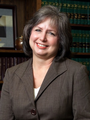 Denise Reid Hoggard represents Rhonda Calaway, the plaintiff in a sexual harrassment and retailiation lawsuit that resulted in a new legal precedent.
