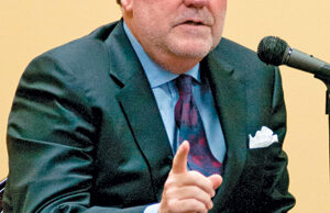 Terry Pillow, Arkansas native, UCA grad and CEO of Tommy Bahama of Seattle, speaks at a business luncheon in Conway.