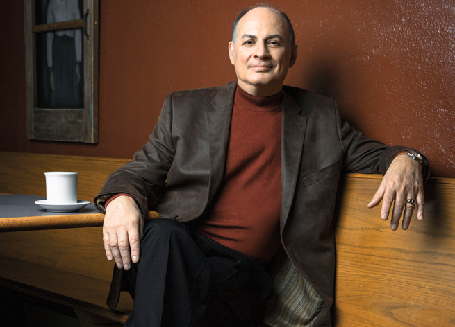 Vincent Insalaco relaxes in a cozy corner of Starving Artist Cafe in Argenta.