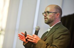 David Tanner of Farmeto gives his pitch at Demo Day, presented by the ARK Challenge, on Thursday at Crystal Bridges Museum of American Art in Bentonville.