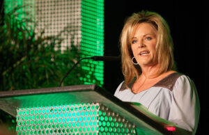 Kim Crook of Arkansas Bank & Trust in Jacksonville accepts her Arkansas Business CFO Lifetime Acheivement Award at a luncheon held Nov. 14 at Embassy Suites in Little Rock.