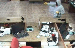 In this series of photos from security cameras, a lone masked robber takes over the Red River Employees Federal Credit Union on Sept. 11, 2009, in Texarkana. The FBI still is seeking the unidentified man, who was armed with a revolver. The bandit took cash from the credit union&rsquo;s vault and from tellers&rsquo; cash drawers before fleeing in a vehicle.&nbsp; []