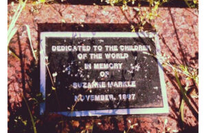 A plaque at Gibbs International Magnet School in Little Rock in memory of Suzanne Markle, who was murdered by her father, along with her mother and sister, in November 1987.