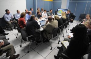 Wal-Mart Stores Inc. employees hold an emergency meeting about Hurricane Sandy at the company's headquarters in Bentonville last October.