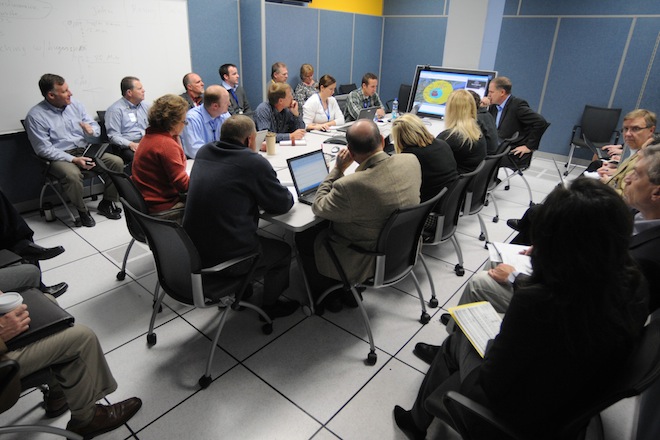 Wal-Mart Stores Inc. employees hold an emergency meeting about Hurricane Sandy at the company's headquarters in Bentonville last October.