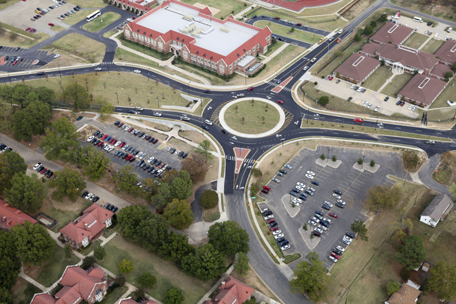 A roundabout at the intersection of Harkrider, Markham and Siebenmorgan streets adjacent to Hendrix College in Conway.
