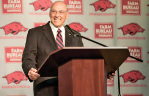 Former Arkansas Razorbacks football coach John L. Smith wants to close his bankruptcy files.