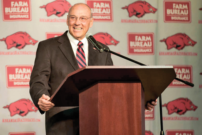 Former Arkansas Razorbacks football coach John L. Smith wants to close his bankruptcy files.