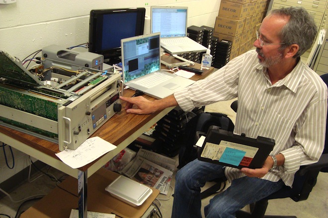 Videographer and former KATV News Director Randy Dixon in 2011, working to digitize 24,000 videotapes from the ABC affiliate's news archives.