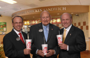 Controversy didn't seem to dent the numbers on Chik-fil-A's 2012. Shown above from left, senior vice-president Bubba Cathy, founder Truett Cathy and president/CEO Dan Cathy.