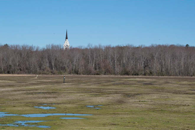 Mulligan&rsquo;s Golf was among the properties assembled by First Pentecostal Church of Jesus Christ, whose steeple is visible in the distance.
