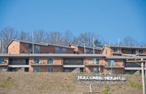 A Denver investment group replaced Metropolitan National Bank as the financier of the 125-unit Holcombe Heights Apartment project in Little Rock.