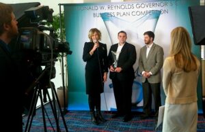 Members of the Picasolar team from the University of Arkansas are inteviewed following their win at the 2013 Donald W. Reynolds Governor's Cup Awards event in Little Rock.