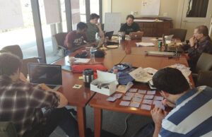 Members of the Simple Service team brainstorm during Startup Weekend Little Rock. Simple Service would go on to win the inaugural event.