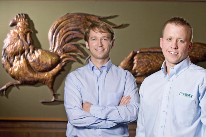 At 30, Carl George, left, and his twin, Charles George, are the same age their father, Gary George, was when he became CEO of George&rsquo;s Inc. of Springdale, the integrated poultry operation where the brothers were recently named co-CEOs.&nbsp;