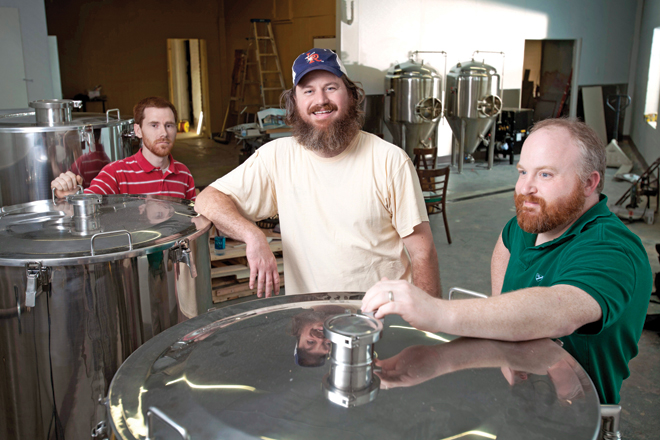 Theron Cash, left, Ian Beard and Shawn Tobin used Kickstarter, a popular crowdfunding platform, to fund a tasting room for the partners&rsquo; Stone&rsquo;s Throw Brewing in Little Rock.&nbsp;