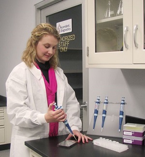 Senior Scientist Anna Daily prepares a tear sample in Ascendant Diagnostics' Fayetteville lab.