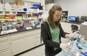BiologicsMD scientist Lindsay Rutherford works in the company's Fayetteville lab.