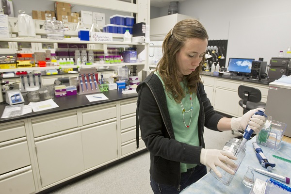 BiologicsMD scientist Lindsay Rutherford works in the company's Fayetteville lab.