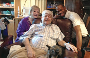 Kayla Stephens and caregiver Quan Smith, right, with Bob, a First Choice client.&nbsp;