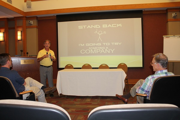UA researcher Ralph Henry, co-founder of Innovate Arkansas firm InterveXion Therapeutics, leads a session on academic startups with IA adviser Jeff Amerine, left, and Jerry Adams of the Arkansas Research Alliance. (Photo by Mai Nguyen)