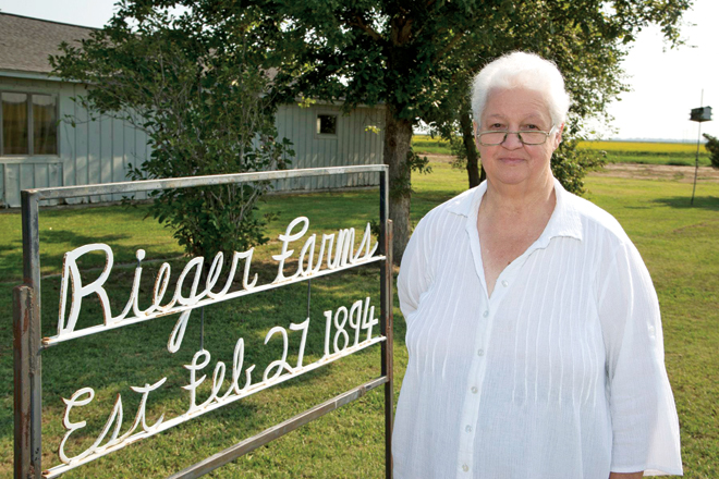 Mary Louise Rieger Bullock outside of Rieger Farms, a property in Stuttgart that is now the center of a lawsuit.