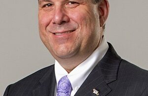 John Simone, president and CEO of USA Truck Inc. of Van Buren.