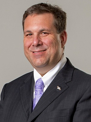 John Simone, president and CEO of USA Truck Inc. of Van Buren.