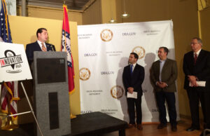 Chris Masingill, co-chair of the Delta Regional Authority, announces a $250,000 grant for the Arkansas Regional Innovation Hub on Monday from the Hub's temporary headquarters in Argenta. At left are Hub director Warwick Sabin; Joel Gordon, director of the planned Launch Pad maker space in the Argenta Innovation Center; and North Little Rock Mayor Joe Smith.&nbsp;