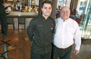 Payne Harding and his father, Rush Harding, CEO of Crews & Associates. Cache, in the Arcade Building, opens for lunch and dinner Jan. 7. (Photo by Russ Powell)