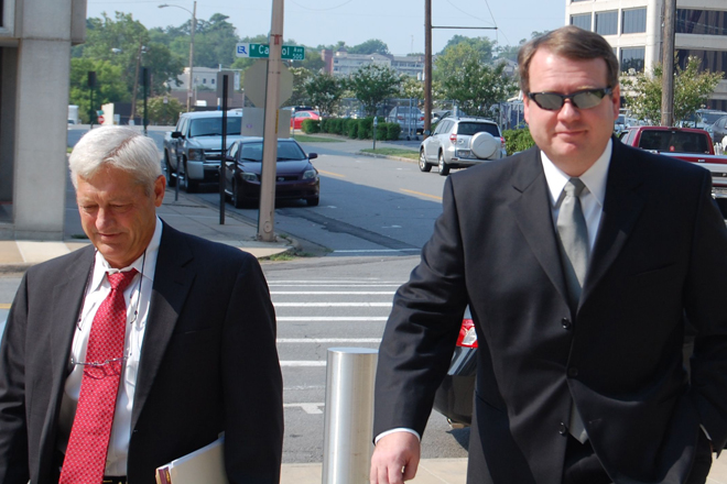 Kevin Lewis, right, and attorney Tim Dudley walk to U.S. District Court in Little Rock. | (Photo by Gwen Moritz)