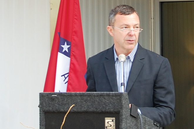 Mark Hickman, president and chief executive officer of Peco Foods, speaks in 2012 about the company&rsquo;s expansion plans in Batesville.