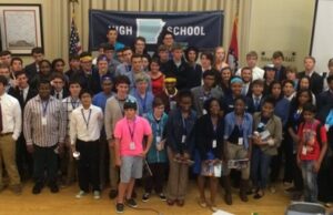 High School Startup Weekend participants from 11 Arkansas schools gathered for a group shot with event emcees Jordan Carlisle and Max Farrell and Noble Impact founder and chairman Steve Clark (far left) Sunday night at the Clinton School's Sturgis Hall.&nbsp;