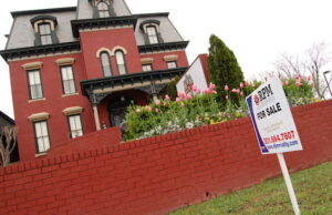 A for sale sign is shown outside Packet House Grill on Monday, April 14, on Cantrell Road.