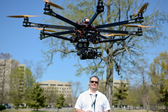 Tim Trieschmann started out using remote airplanes to take still photos. But rotor technology has advanced far enough that it affords superior stability for shooting aerial video, allowing him to find work with film studios and TV stations.