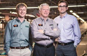 Bill Schlatterer, president and CEO of Replacement Parts Inc., is flanked by (left) Crow Lord, operations manager of the store group, and Ben Butler, purchasing and inventory manager. Lord and Butler represent part of the fourth generation involved in the family business.