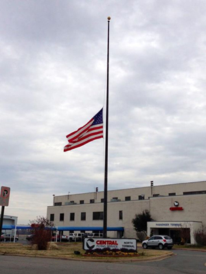 Central Flying Service flew its flag at half-staff outside of its Little Rock office in January 2013 following the death of one its pilots in a Louisiana crash.