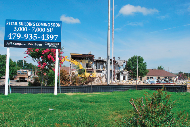 A former Saturn dealership on Warden Road in North Little Rock is giving way to a Chuy’s restaurant and more. | (Photo by Rob Moritz)
