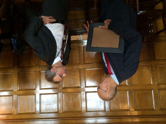 Dr. Gareth Morgan (left) of UAMS, the newest ARA Scholar, visits with current ARA Scholar Dr. Peter Crooks of UAMS at Wednesday's announcement.&nbsp;
