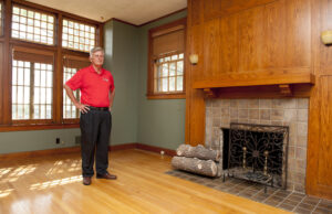 Gov. Mike Beebe stands in the living room of the V.C. Kays House.