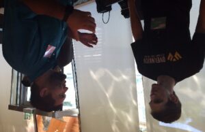 Overwatch CEO Josh Moody talks startups with Springfield, Mo., entrepreneur Jeremy Bartlett at Thursday's ARK Challenge Demo Day in Bentonville.