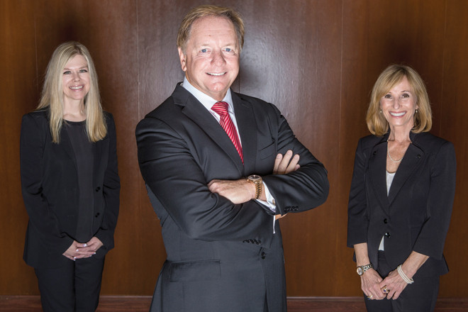 Cameron Smith with Catherine Corley, left, and Denise Natishan, the Cameron Smith & Associates team leading the effort to place women on corporate boards of directors. | (Photo by Beth Hall)