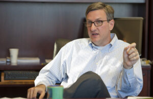 Arkansas Securities Commissioner Heath Abshure says many seniors are too embarrassed to report that they were victims of a scam. | (Photo by Jason Burt)