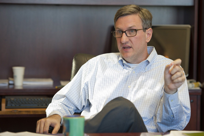 Arkansas Securities Commissioner Heath Abshure says many seniors are too embarrassed to report that they were victims of a scam. | (Photo by Jason Burt)